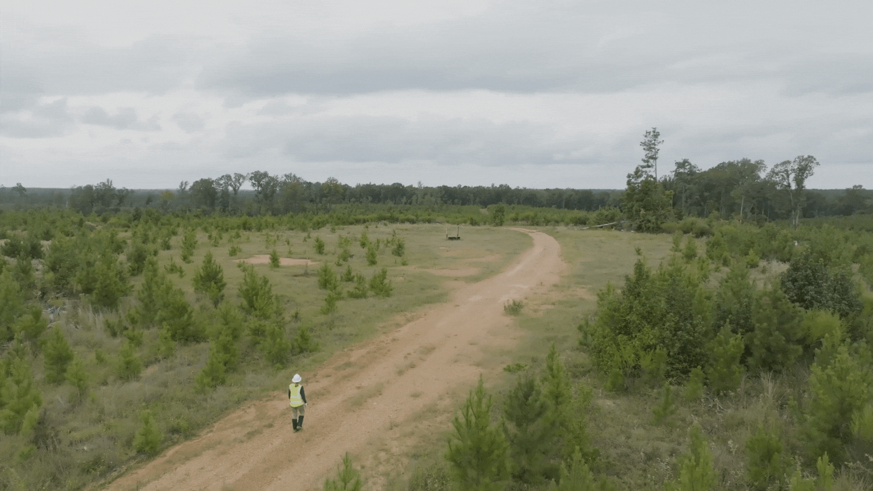 Ashley Palomino, Portfolio Manager, Environmental and Property Solutions, walks one of the sites in Arkansas Columbia County where weve begun our lithium work. The lithium-rich brine reservoirs we plan to produce are about 10,000 feet underground.